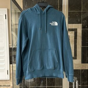 The North Face blue hoodie, size S, like new condition.